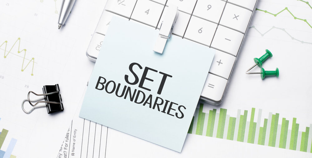 text set boundaries Written words on paper notebook . workplace. Business concept.