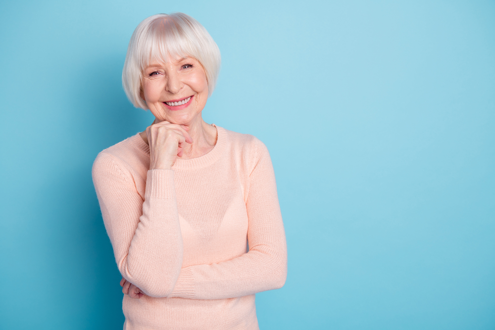 Portrait of her lovely kind gray-haired lady enjoying healthy life, isolated on bright vivid shine blue green turquoise background representing inner balance over work-life balance